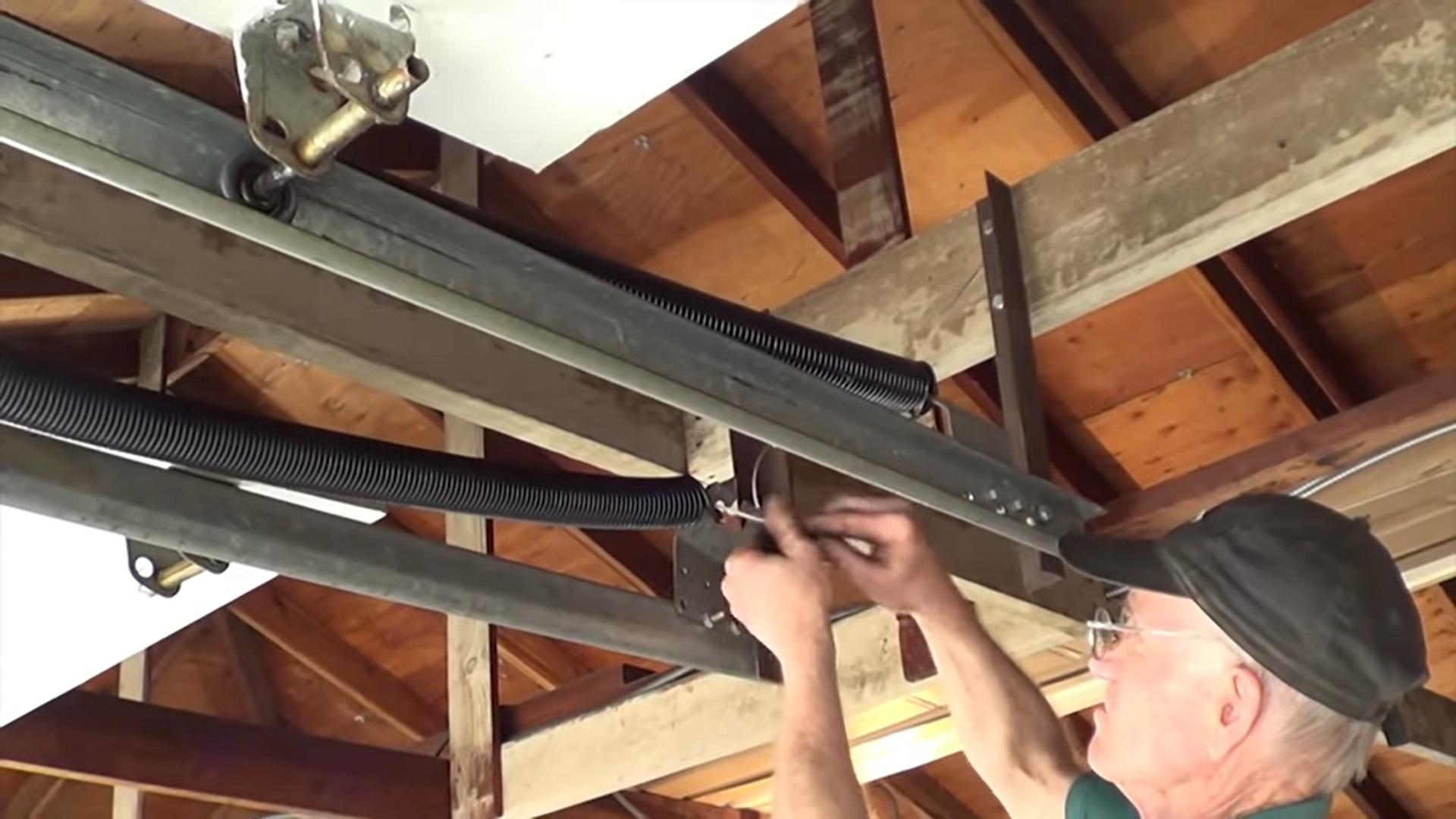Extension spring replacement services - AK Garage Door Service